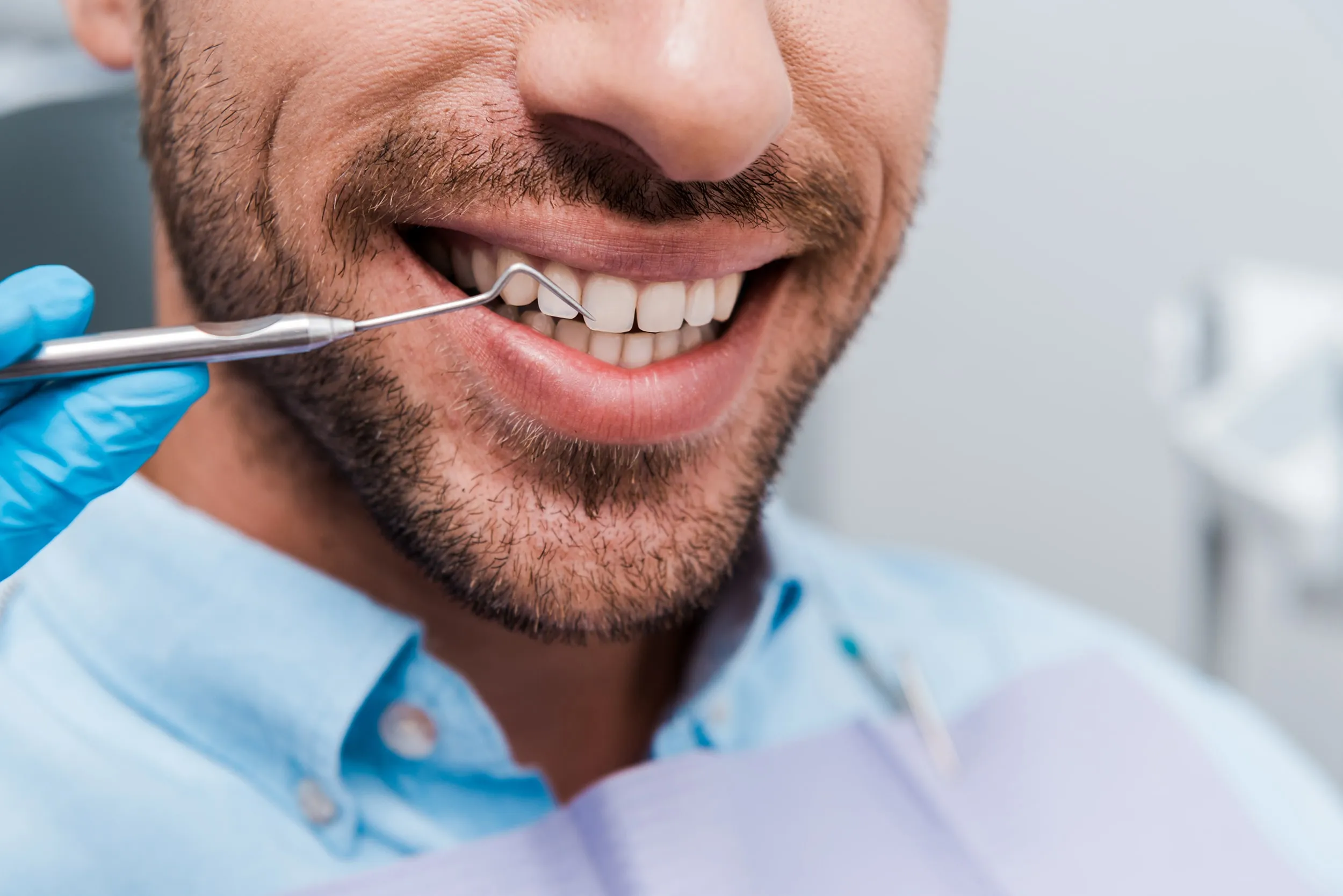 A bright smile being shade checked